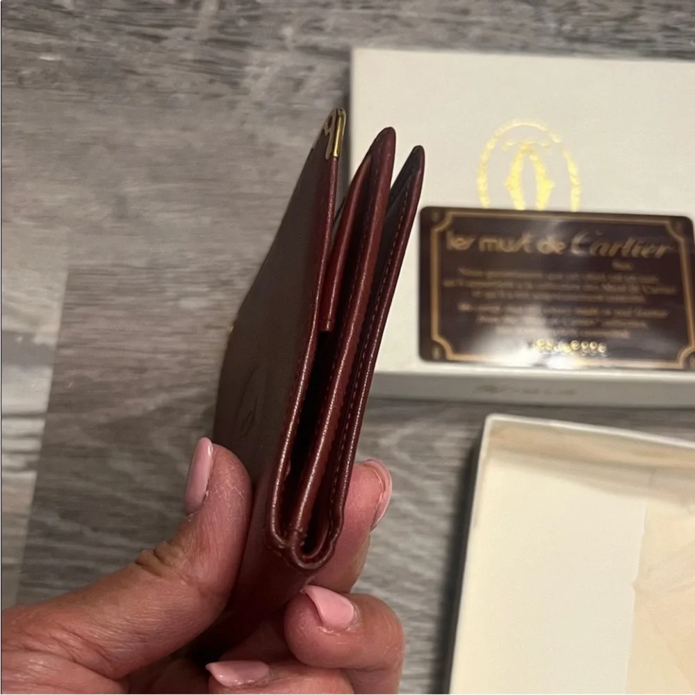 Cartier Burgundy Leather Wallet with Gold Accents